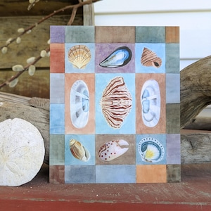 May include: Square watercolor painting featuring a grid of nine different seashells. The shells are painted in realistic detail with a variety of colors and patterns, set against a backdrop of muted squares in blue, brown, and purple.
