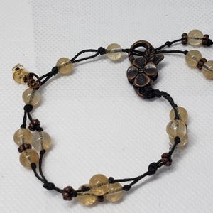 Gold Rutilated Quartz Bracelet: Waxed Linen, Antique Copper Clasp