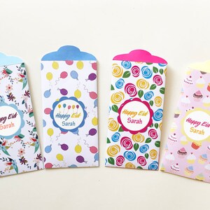 Personalized Eid money envelope with Arabic or English text. Flowers, balloons, and cupcakes pattern.