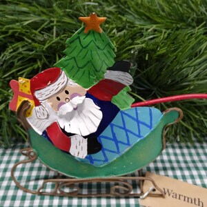 ヴィンテージ塗装済み金属製サンタのそりキャンドル消し - Etsy 日本
