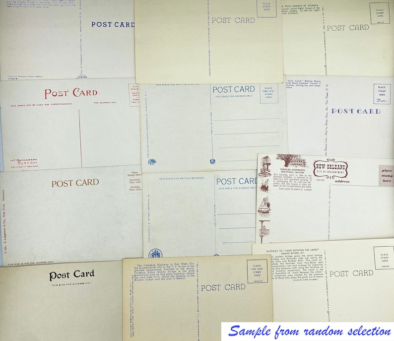May include: A collection of vintage postcards with the text "Post Card" printed on each. The postcards are in various shades of white and cream with blue and red accents. Some of the postcards have images of buildings and landscapes.