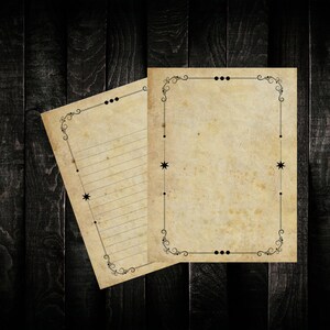 May include: Two vintage-style stationery sheets with decorative borders. The sheets are lined and have a distressed, aged look. The borders feature stars and dots.
