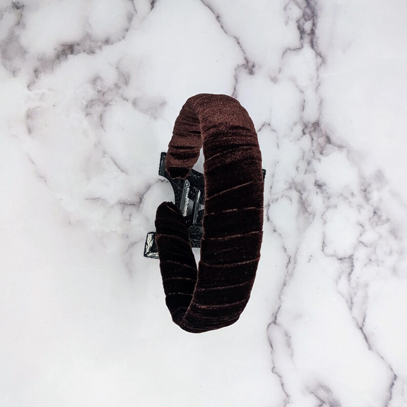 chocolate brown velvet padded headband photographed from above