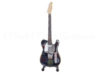 Miniature Guitar JOE STRUMMER with stand. The CLASH