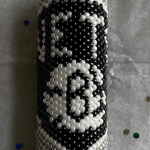 Hand beaded NBA Brooklyn Nets keychain. Nets keychain, designer Brooklyn Nets keychain. Brooklyn Nets specialty designer keychain.