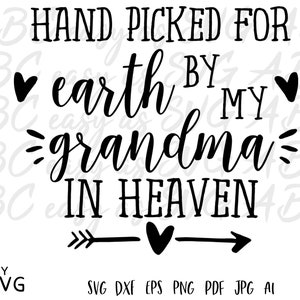May include: Black and white graphic design with the text "HAND PICKED FOR earth BY MY grandma IN HEAVEN" with a heart and arrow design.