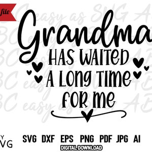 May include: Black and white graphic design with the text "Grandma has waited a long time for me" with hearts around the text.