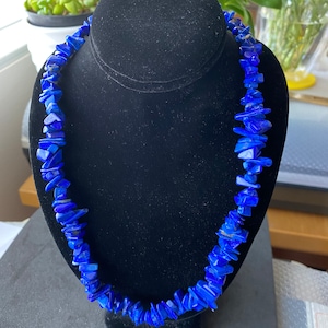 AAA And AA Natural Blue Lapis 10-12mm Chips " 17.5" And With Shiny Gold Plated Necklace End Clips .
