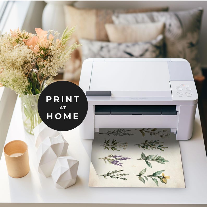 May include: A white printer with a sheet of paper coming out of it. The paper has a watercolor illustration of various types of herbs and flowers. The text "PRINT AT HOME" is on a black circle in the foreground.