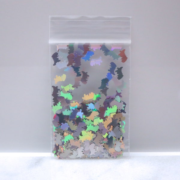 Laser Holographic Silver Baby T-Rex Glitter | Baby DINOSAUR | Holo | Solvent Resistant | Slime | Nail Art | Resin Jewelry | Tumbler