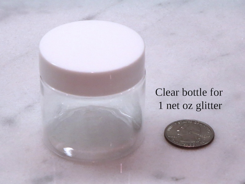 May include: Clear plastic bottle with a white lid, next to a US quarter, for 1 net oz glitter.