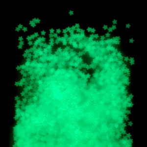 May include: A pile of green glitter stars on a black background. The stars are glowing in the dark.