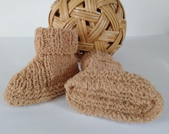 Hand knitted baby slippers for babies born to 3 months