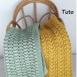 May include: Two crocheted blankets, one green and one yellow, are draped over a wicker chair. The word "Tuto" is written in black text on a white background in the upper right corner of the image.
