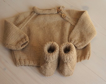 Baby knitted sweater and booties set