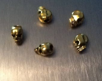 Lots perles cràne métal dorées