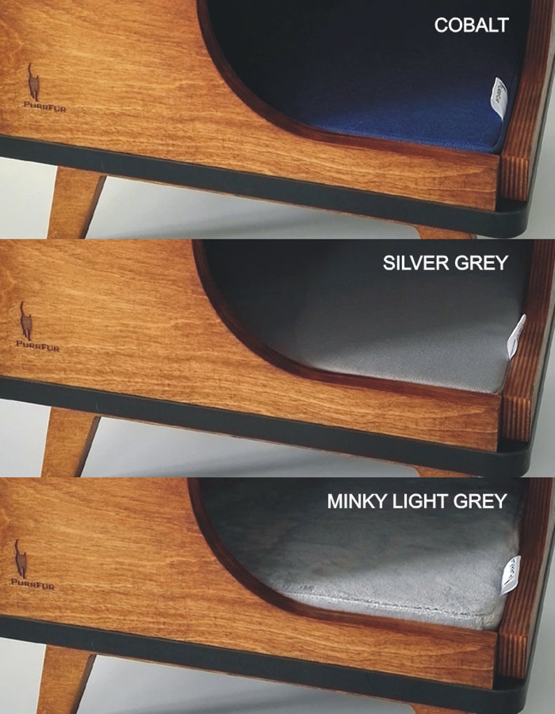 May include: A wooden cat bed with a curved opening and a removable cushion. The cushion is available in three colors: cobalt blue, silver grey, and minky light grey. The bed has a black trim around the edge and the brand name "Purrfur" is printed on the front.