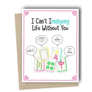 May include: A greeting card with the text "I Can't Imahjong Life Without You" and various Mahjong tiles. The card includes speech bubbles with phrases like "You are BAMtastic" and "You CRACK me up". The card is on a kraft paper envelope.