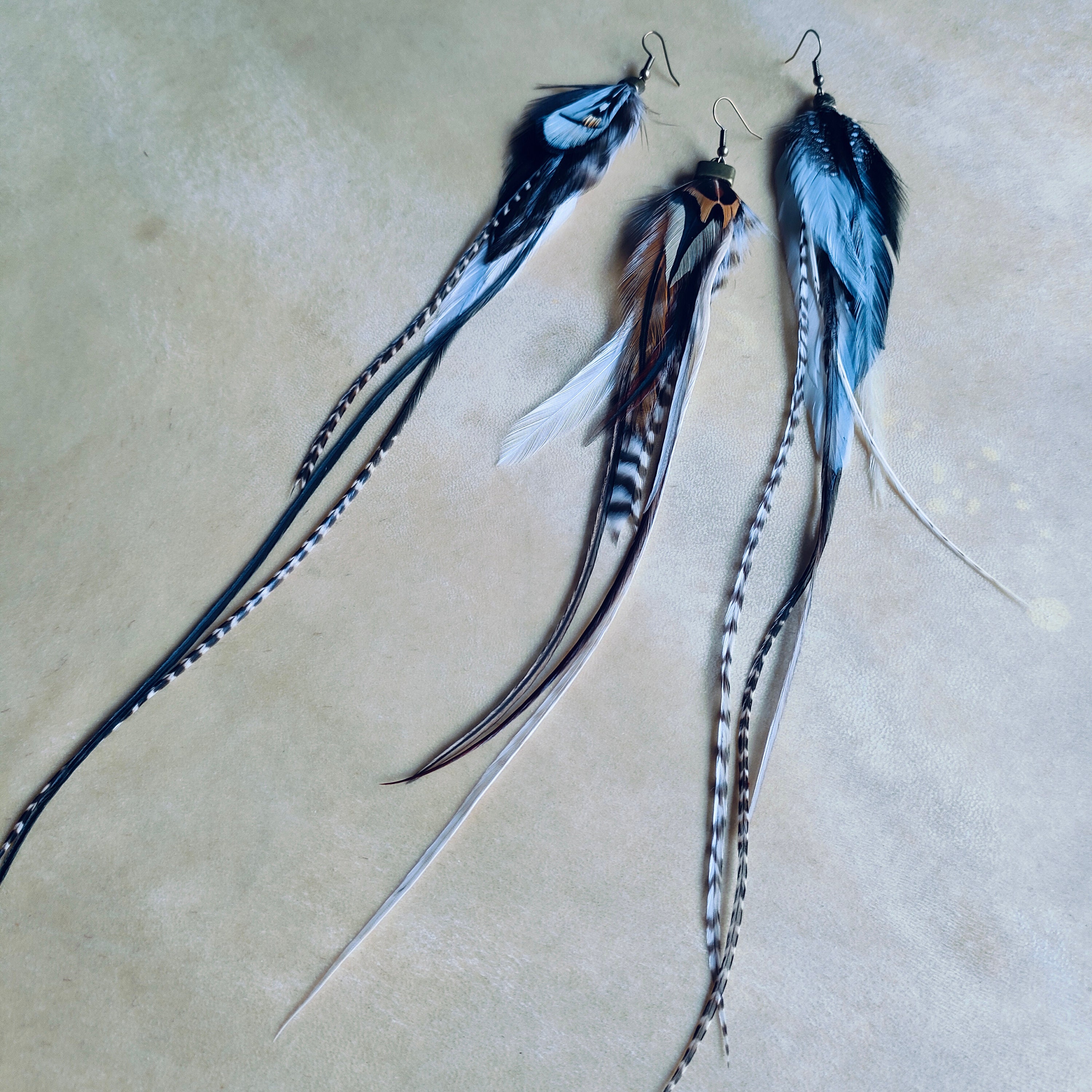 Boucles D'Oreille Percées 'Solitaire' En Forme De Plumes - Occasion (État Neuf)