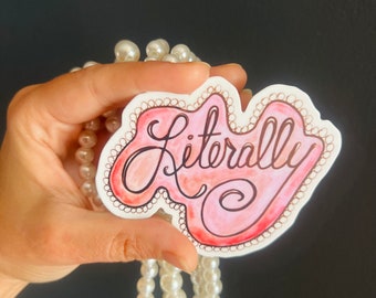 May include: A pink and white sticker with the word "Literally" written in cursive. The sticker has a decorative border of small circles.