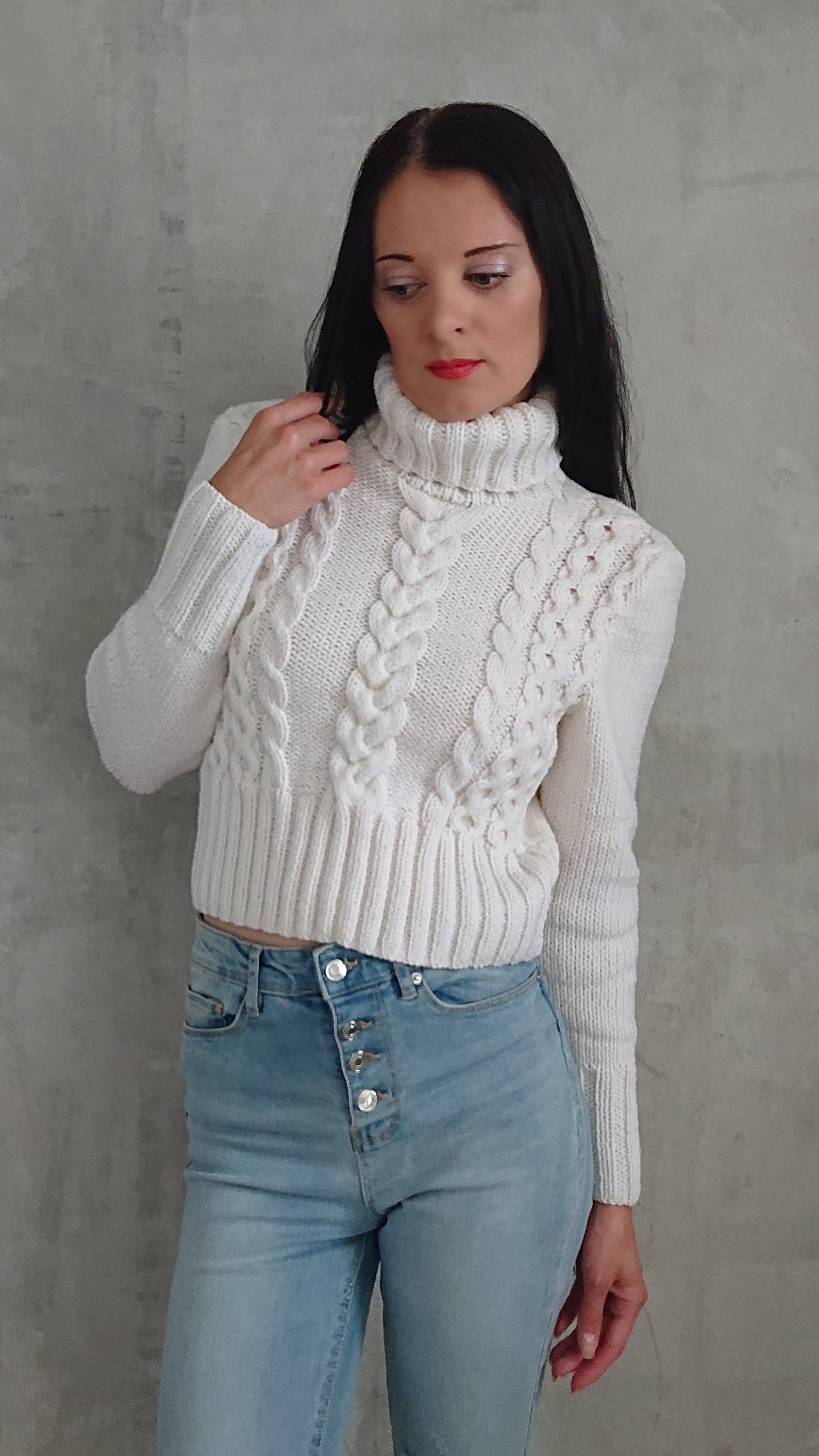 white cable knit turtleneck