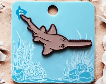Brown sawfish pin
