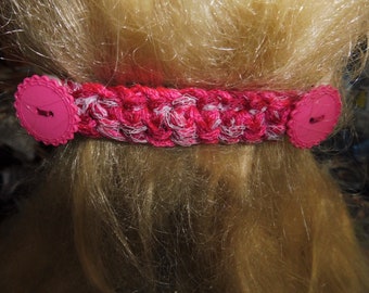 Grosse barrette à cheveux rose avec boutons pour attacher le masque