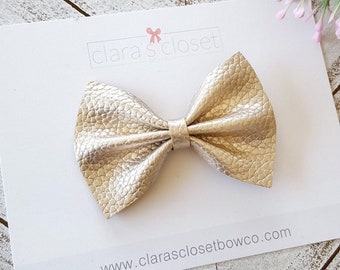 gold bow for baby