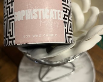 The sophisticated Hustler. Tobacco Bergamot 8 oz black tin candle