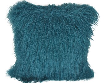 teal fluffy pillow