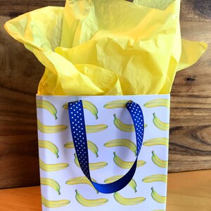 banana giftwrap made into giftbag with yellow tissue paper