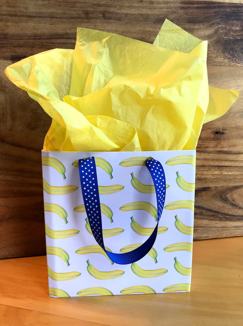 banana giftwrap made into giftbag with yellow tissue paper