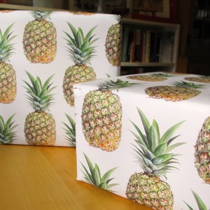 Each sheet of pineapple wrapping paper can wrap two shoe-box-sized gifts or many small ones.