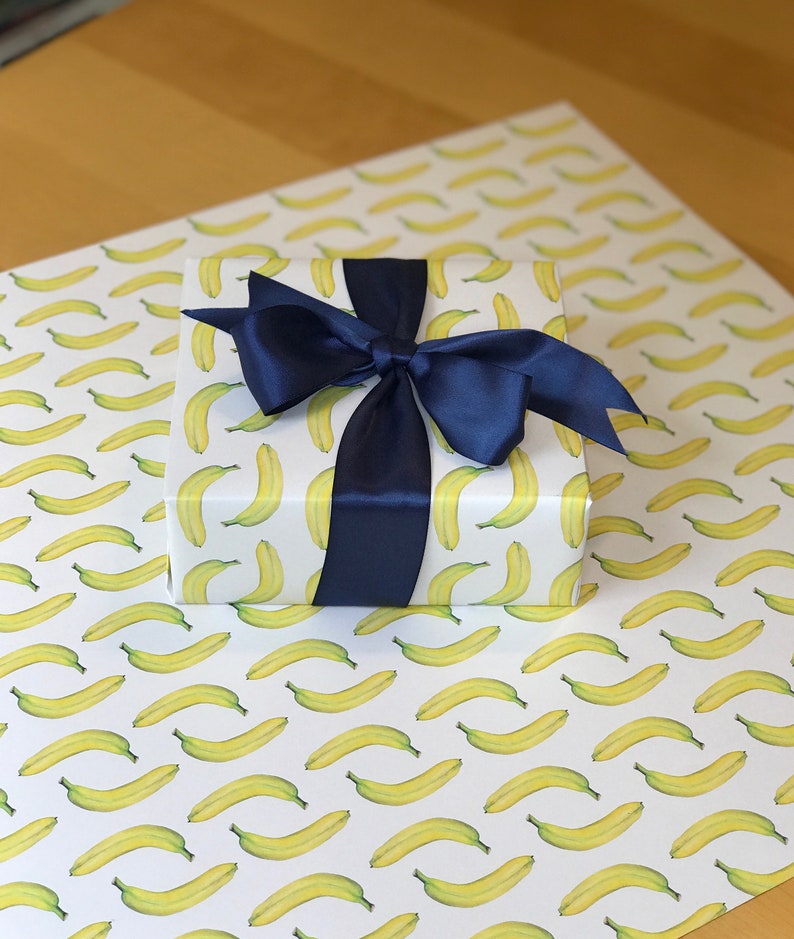 Banana paper wrapped gift on sheet of banana giftwrap