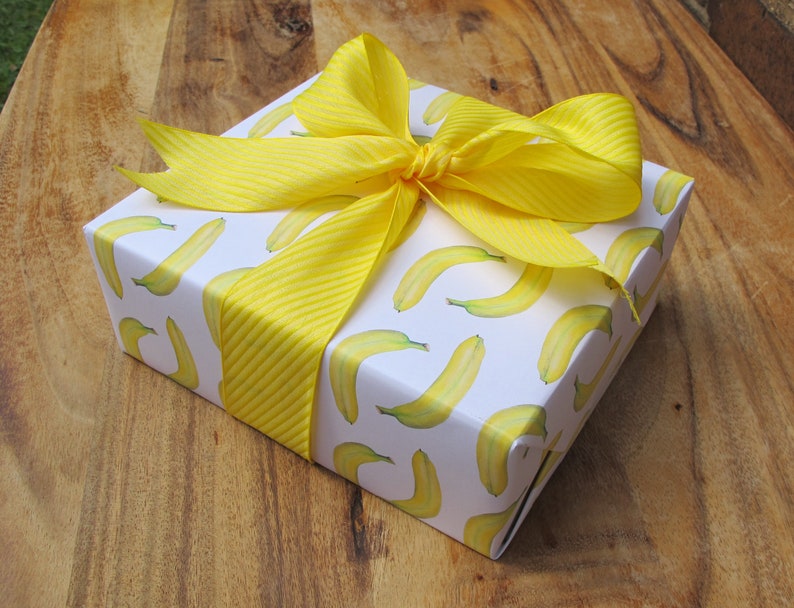 Banana paper wrapped gift with yellow ribbon