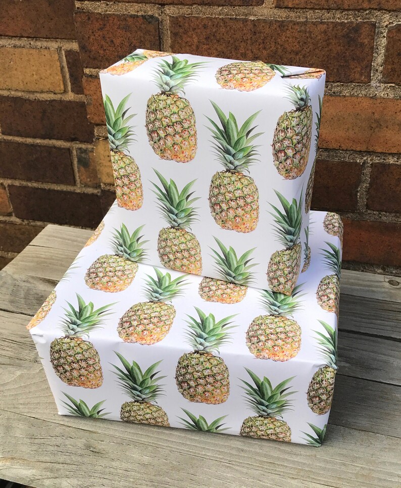 Uniquely bold and realistic pineapples gives this tropical giftwrap a classy feel and crisp, papery texture.