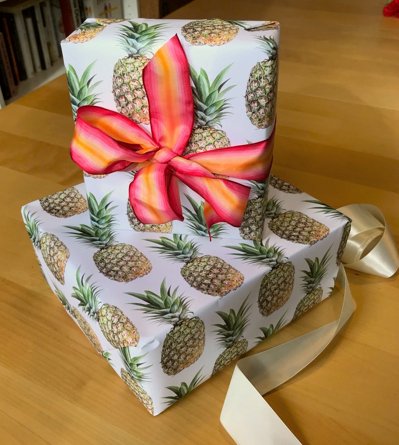 Pineapple giftwrap is perfect for housewarming gifts and tropical-themed parties!