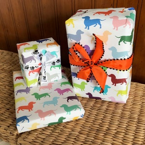 This thick, opaque wrapping paper featuring dachshunds is perfect for gifts of all kinds and complements any color ribbon!
