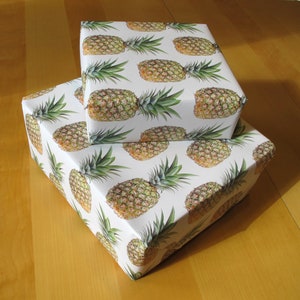 Each pineapple printed on this luxury giftwrap is a 4-inch high reproduction of a life-sized realistic painting I did of a pineapple.