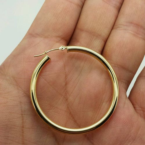 14K Yellow Gold Hoop Earrings Approximate Measurements 33mm x 3mm 14K Yellow Gold Hoop Earrings Approximate Measurements 33mm x 3mm
