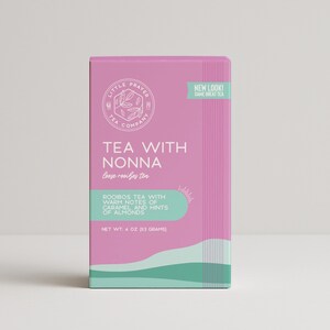 May include: Pink box with a teal and white design. The box contains loose rooibos tea called "Tea with Nonna". The text on the box reads "Rooibos tea with warm notes of caramel and hints of almonds". The net weight is 113 grams.