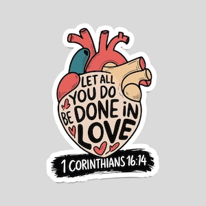 May include: A sticker with a heart-shaped design featuring a stylized anatomical heart with the text "Let all you do be done in love" and the scripture reference "1 Corinthians 16:14".