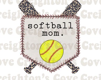 May include: A brown and white baseball home plate with a softball and two crossed bats with a leopard print design. The text "softball mom." is written on the home plate.