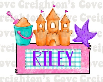 May include: A pink and blue personalized sign with the name "RILEY" in purple text. The sign features a cartoon sandcastle, a bucket and shovel, and a purple starfish.