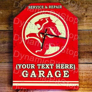 May include: Red metal sign with a white lion logo and clock hands. The sign says "SERVICE & REPAIR" and "(YOUR TEXT HERE) GARAGE".