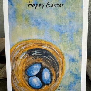 Biglietto di auguri di buona Pasqua. Dipinto ad acquerello originale, stampato su carta di lino. Include busta autosigillante colorata complementare