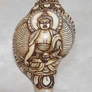 Handcarved Conch of Shakyamuni Buddha with Bhumisparsha Mudra. 100 % Handmade from Nepal