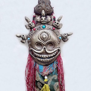 De dansende skeletten: Citipati messing muurkunst