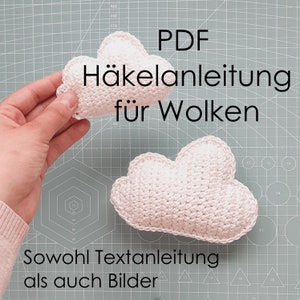May include: PDF crochet pattern for making clouds. The pattern includes both written instructions and images.  Sowohl Textanleitung als auch Bilder.