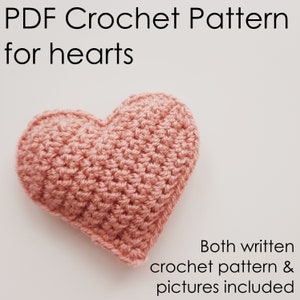 May include: A crocheted pink heart with a white background. The text "PDF Crochet Pattern for hearts" is at the top of the image. The text "Both written crochet pattern & pictures included" is at the bottom of the image.